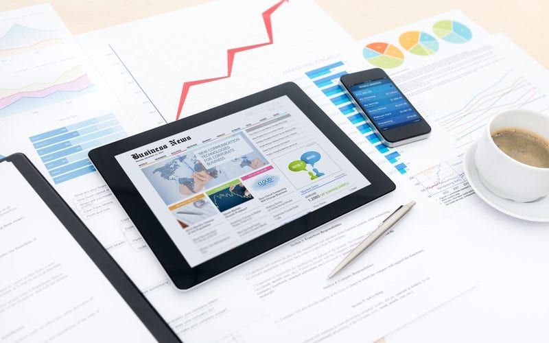 Marketing Metrics Displayed On Devices And Paper