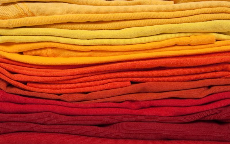 Stacked Linens Of Warm Colors