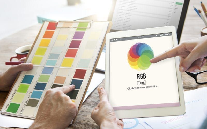 Color Samples Being Reviewed On An Ipad