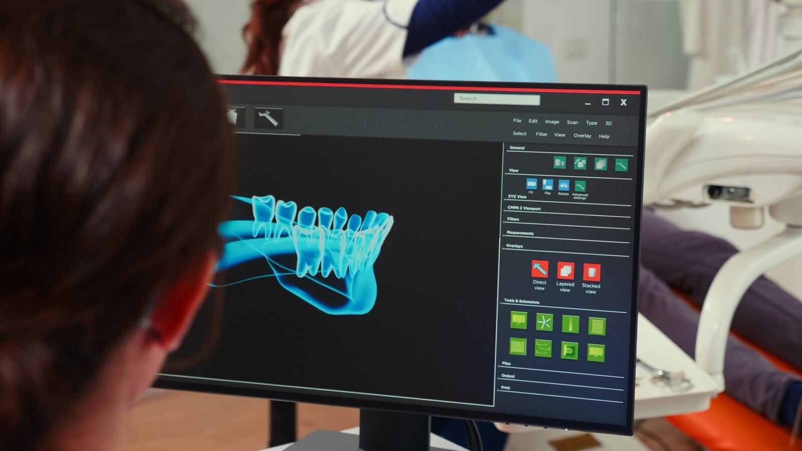 Stomatologist Nurse Looking At Digital Dental Fingerprint On Computer