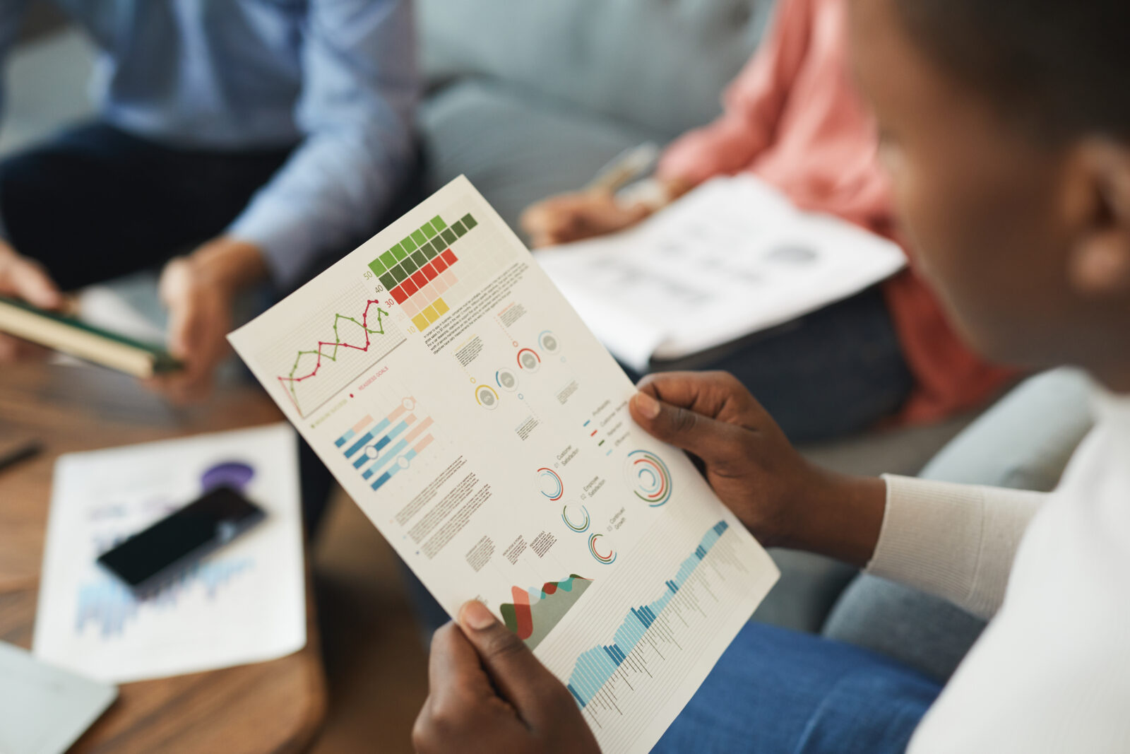 African Businessman Reading Data Chart